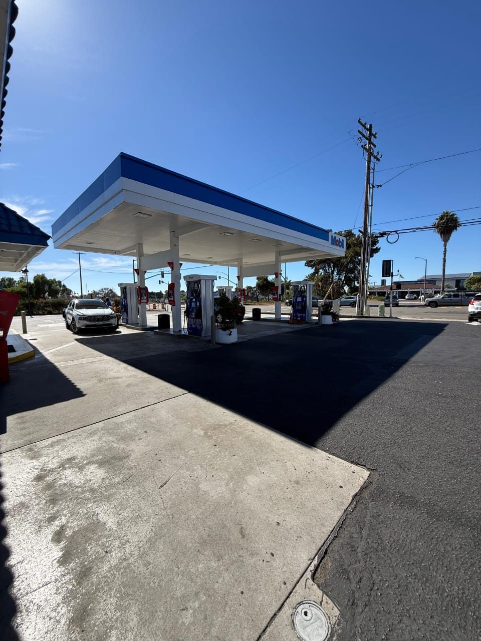 Carlsbad Mobil Gas Station canopy and fuel pumps on Tamarack Ave in Carlsbad, CA